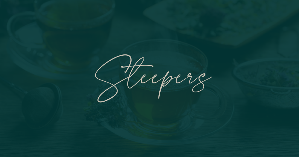 herb bae tea cup steepers strainers on glass plate